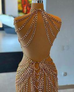 Luxury Party Dresses With Long Train, Luxury Evening Dress With Long Train For Party, Luxury Gold Embellished Evening Dress, Luxury Gold Evening Dress For Prom, Luxury Gold Evening Dress, Luxury Halter Neck Evening Dress For Party, Fitted Luxury Gold Gown, Gold Fitted Luxury Gown, Luxury Fitted Gold Gown