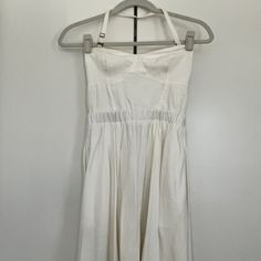 Size 2 White Mini Sundress By Talula From Aritzia. Never Worn. Fitted A-line Halter Sundress, Cotton Beach Dress With Fitted Bodice, Cotton Dresses With Fitted Bodice For The Beach, Fitted Bodice Cotton Beach Dress, Summer Dresses With Lined Fitted Bodice, Halter Neck Dress With Fitted Bodice And Lining, Halter Neck Fitted Bodice Lined Dress, Fitted Bodice Halter Neck Lined Dress, Lined A-line Sundress For Daywear