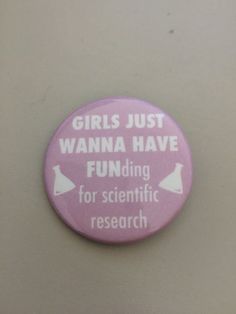 a pink button that says girls just wanna have funding for scientific research