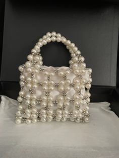 White Embellished Shoulder Bag For Gift, Pearl Bags Perfect As Gifts, Pearl Handheld Bag As Gift, Beaded Pouch Shoulder Bag As Gift, Handheld Pearl Bags As Gift, White Beaded Shoulder Bag As A Gift, Beaded Pouch Shoulder Bag For Gift, Handheld Bags With Pearl Embroidery For Gift, White Beaded Shoulder Bag As Gift