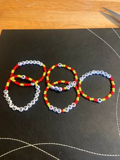 Assorted ferrari bracelet stacks :) stack 1- both drivers  stack 2-charles leclerc  stack 3-carlos sainz Charles Leclerc Bracelet, Ferrari Bracelet, F1 Bracelet, F1 Ferrari, Bracelet Inspiration, Bracelet Stacks, Lil Bro, Bracelet Inspo, Bracelets Ideas