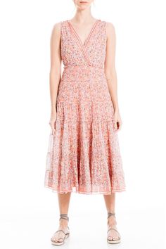 A sleeveless A-line midi dress features a paneled flared skirt with a floral print for feminine style. Surplice neck. Sleeveless. Slips on over head. Paneled A-line skirt. Mesh exterior. Lined. Approx. 48" length (size S). ImportedAvailable in:. Dot print (NVRDDTVB). Floral print (BKMNRLFL, BLKBLWFL) Flowy A-line Lined Midi Dress, Elegant Sleeveless Midi Dress With Ditsy Floral Print, Floral Print A-line Sleeveless Sundress, Spring Floral Print A-line Sleeveless Dress, Spring Floral Print Maxi Sleeveless Dress, Spring Floral Print Sleeveless Maxi Dress, Floral Print Sleeveless Maxi Dress For Spring, Elegant Sleeveless Dress With Ditsy Floral Print, Feminine Sleeveless Maxi Dress For Spring