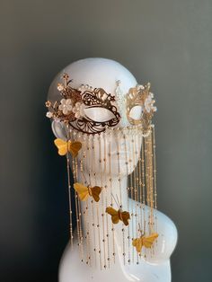 This elegant golden metal masquerade mask features dangling butterflies with floral notes and pearls. The mask is made out of comfortable and lightweight metal, great for long time wear! I N C L U D E D Mask comes with matching ribbons. S H I P P I N G -  Processed same day or within 24 hours.  1-2 day guaranteed delivery, add item to cart, click shipping tab for rates.  Pls leave a check out note with your need date & contact number  Msg for delivery time frames (Include your state/country) S I Luxury Masks And Prosthetics For Mardi Gras, Masquerade Mask Stars, Elegant Gold Masquerade Mask As Gift, Gold Eye Mask For Carnival, Gold Carnival Masquerade Eye Mask, Gold Adjustable Masquerade Mask, Elegant Gold Eye Mask For Masquerade, Gold Masquerade Mask For Carnival, Gold Fantasy Masquerade Mask For Party