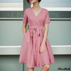 Olivia Mark - Chic Midi Dress with V-Neckline, Solid Color, Short Sleeves, Pockets, Bow Tie Waist Belt, and Cotton Linen Material