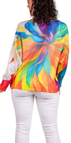 Batwing Long Sleeve Sweater Featuring a Multi-Color Floral Print. 65% Polyester, 35% Viscose One Size Fits Most Made in Italy Model 5'7" Multicolor Long Sleeve Tops With Rainbow Print, Multicolor Crew Neck Top For Vacation, Multicolor Print Long Sleeve Tops For Vacation, Colorful Long Sleeve Vacation Top, Multicolor Rainbow Print Tops For Spring, Rainbow Long Sleeve Tops For Spring, Multicolor Summer Sweater For Vacation, Vibrant Printed Long Sleeve Tops, Multicolor Vacation Sweater For Spring