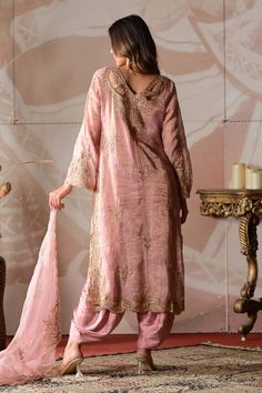 Pink kurta with cutdana cutwork embroidery. Paired with a dhoti pant, inner and embroidered dupatta. - Aza Fashions Designer Slub Silk Salwar Kameez With Dabka, Transitional Slub Silk Salwar Kameez With Dabka, Elegant Slub Silk Palazzo Set With Dupatta, Bollywood Style Unstitched Tissue Silk Palazzo Set, Raw Silk Cutdana Unstitched Sets, Designer Tissue Silk Unstitched Suit With Dabka, Tissue Silk Palazzo Set With Zari Work, Elegant Slub Silk Unstitched Suit For Eid, Bollywood Style Churidar With Traditional Drape