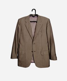 CORNELIANI vintage men's suit jacket, made in Italy Very good used condition Size tagged 50, fits like L (please check measurements) Composition: 67% wool, 33% silk (primary fabric), 100% cupro (lining) Measurements: Shoulder to shoulder - 18.1″ / 46 cm Pit to pit - 21.7″ / 55 cm Back length from collar - 30.3″ / 77 cm Sleeve length from shoulder - 24.8″ / 63 cm *All measurements are taken with the garment laying flat #2091 We are ready to make a discount when buying more than one item. Let us k Vintage Blazer With Suit Collar For Business Casual, Vintage Blazer For Business Casual, Vintage Suits With Welt Pockets For Business, Tailored Vintage Business Suits, Vintage Tailored Suit With Long Sleeves, Tailored Vintage Suit, Vintage Business Sport Coat With Flat Front, Tailored Vintage Business Sport Coat, Vintage Business Suits With Lapel Collar