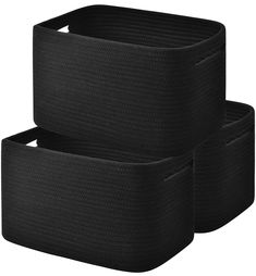 two black storage baskets sitting next to each other