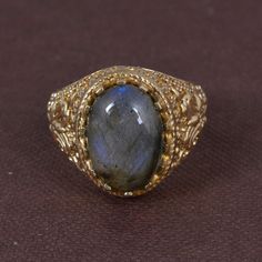 Labradorite Brass Ring, Antique Labradorite Ring, Healing Gemstone Ring, Vintage Labradorite Ring, Boho Ring, Ornate Ring Handmade PRODUCT CODE :- HA1 Stone:- Labradorite Material:- Brass Size:- Any ♥Brass, unlike gold, is a metal that can oxidize over time. To avoid and delay this oxidation, I recommend that you do not sleep with your jewels, and not expose them to water. ♥Ring can be customized on request and gemstone can be made to any gemstone you want. Same Design Ring Are Upload With Any G Gold Labradorite Gemstone Rings, Gold Rings With Labradorite Gemstone, Unique Gold Labradorite Rings, Spiritual Gold Labradorite Rings, Gold Rings With Labradorite Natural Stones, Gold Emerald Ring With Natural Stones For Anniversary, Spiritual Gold Rings With Natural Stones, Gold Labradorite Rings For Anniversary, Gold Oval Opal Ring For Jewelry Making