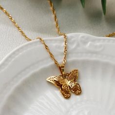 Beauty of nature and the elegance of gold with our 18K Gold Butterfly Pendant Necklace. Elevate your style, celebrate life's moments, and embrace the grace of the butterfly with this captivating and unforgettable piece. Its clean lines and graceful form make it a versatile piece that effortlessly complements a range of styles, from understated elegance to modern chic.- 40cm + 5cm =45cm total length- 18k gold filled - glossy gold finish★- on vintage gold side★- lobster claw closure- tarnish resis Butterfly Aesthetic, Fantasy Clothes, Butterfly Fashion, Butterfly Pendant Necklace, Gold Butterfly, Understated Elegance, Butterfly Necklace, The Grace, Butterfly Pendant