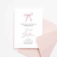 a card with a pink bow on it