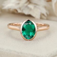 Discover timeless elegance with our Classic Solitaire 8x6mm Oval Cut Bezel Emerald Ring for Women in 14K Rose Gold, a symbol of style and sophistication. Elegant Oval Rose Gold Emerald Ring, Elegant Rose Gold Oval Emerald Ring, Elegant Oval Emerald Ring With Bezel Setting, Formal Oval Emerald Ring In Rose Gold, Rose Gold Oval Emerald Ring, Formal Rose Gold Oval Emerald Ring, Rose Gold Oval Emerald Ring For Anniversary, Oval Emerald Ring In Rose Gold, 14k Rose Gold Solitaire Oval Jewelry