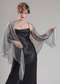 "100% silk iridescent chiffon shawl Color: #151 Silver Grey Width from tip to tip - 64\" Length to point of widest part - 30\" Care Instructions: hand wash cool, hang up to dry, iron with No Steam! Before you will make your order you can purchase a swatches to view and touch a real material.  - https://www.etsy.com/listing/110137147/swatches-set - https://www.etsy.com/listing/183186969/swatches-of-iridescent-chiffon-one-of-35 PROCESSING TIME: Since all of my items are custom made, average manufa Wedding Shawls, Silk Chiffon Scarves, Chiffon Shawl, Light Silk, Wrap Shawl, Gray Silk, Chiffon Scarf, Natural Silk, Formal Attire