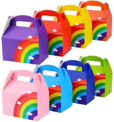 six different colored boxes with handles and rainbow designs on the sides, all lined up