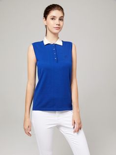 Description Our vintage-inspired ladies polo shirt is a subtle nod to the glamour of the 1920s. You can wear it by itself when you’re hitting the golf or tennis course or layer it with a jacket for your post-game drinks at the clubhouse. You can dress this closet staple up or down, depending on the occasion. The cotton-cashmere blend gives you a luxury feel with added comfort and breathability to get you from day till night. As a lightweight polo shirt, you can wear it while working on your tan Ladies Polo Shirt, Poolside Bar, The 1920s, Polo Shirt Women, Sustainable Fabrics, Vintage Inspired, Sleeveless Top, Tennis, Polo Shirt