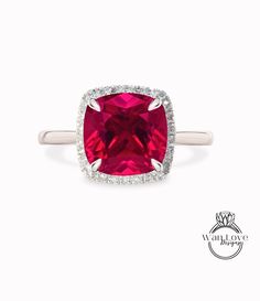 Anello di fidanzamento con rubino taglio cuscino, anello di alone in oro rosa, anello di promessa di anniversario in stile art deco con fascia affusolata semplice e sottile, con alone di diamanti

 Questo anello verrà creato con la dimensione della gemma centrale scelta. Personalizza sia la dimensione della gemma centrale che le gemme d'accento per creare il tuo look unico. L'accessorio definitivo per ogni grande giorno o da indossare tutti i giorni!! È il regalo perfetto per quella persona speciale nella tua vita. Sicuramente sarà apprezzato per tutta la vita! Cerchi qualcosa di particolare/personalizzato? Si prega di chiedere dettagli e prezzi.

 **Mostrato con la dimensione 8 mm per gli esempi

 INCISIONE

 ✦ Gratuito per ordini superiori a $ 500. Include 12 personaggi compresi gli spaz 14k White Gold Ruby Ring With Halo Setting, Diamond White Cushion Cut Halo Ring For Promise, Ruby Ring With Brilliant Cushion Cut For Anniversary, Ruby Ring With Diamond Halo In Round Cut, Fine Jewelry Ruby Ring With Halo, Ruby Ring With Cushion Cut For Anniversary, Cushion Cut Diamond Ring With Halo Setting For Anniversary, Princess Cut Halo Ring For Formal Occasions, Formal Princess Cut Halo Ring