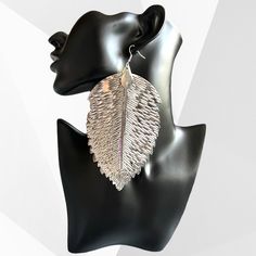 These are large statement earrings that will turn heads and all eyes on you. They are perfect for special events like weddings, parties and nightlife. They are also lightweight, and come in two colors, gold and silver. Keep away from water. Elegant Party Earrings For Summer, Trendy Silver Hoop Earrings For Evening, Elegant Summer Party Earrings, Leaf-shaped Metal Earrings For Party, Leaf-shaped Metal Jewelry For Party, Trendy Silver Hoop Earrings For Wedding, Trendy Silver Hoop Earrings For Party, Silver Leaf-shaped Earrings For Party, Elegant Leaf-shaped Earrings For Party