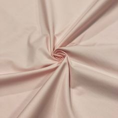 a close up view of a pink fabric