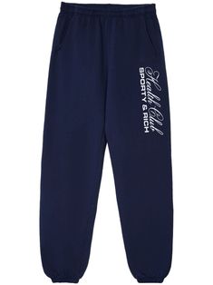 navy blue cotton logo print at the leg elasticated waistband slip pockets to the sides rear patch pocket straight leg elasticated ankles When buying this unisex item, keep in mind that it is graded in standard men's sizing. Sports Cotton Pants With Logo Print, Navy Cotton Sweatpants For Sports, Sporty Relaxed Fit Pants With Logo Print, Cotton Jogging Pants With Logo Detail, Cotton Jogging Bottoms With Logo Print, Cotton Bottoms With Logo Print For Jogging, Straight Leg Cotton Sweatpants With Letter Print, Navy Cotton Jogging Bottoms, Navy Relaxed Fit Joggers For Streetwear