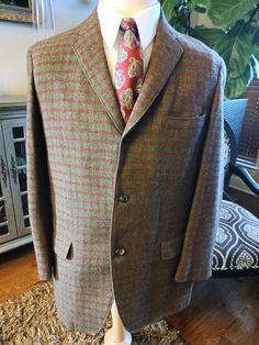 This is a Vintage 70's Custom Made Westminster Plaid Unstructured Blazer Sz 40R. Made in the USA of 100% Wool this handsome blazer features a 3 button front, a notched collar and lapels, side pockets and a center back vent. It has been gently worn and is in excellent condition. Measurements Length 31.5" Shoulders 19" Sleeves 24" Chest 40" Notch Lapel Sport Coat With Buttons For Fall, Fall Sport Coat With Notch Lapel And Buttons, Fall Notch Lapel Sport Coat With Buttons, Fall Notch Lapel Sport Coat, Fall Single Breasted Button-up Sport Coat, Fall Semi-formal Button-up Sport Coat, Classic Button-up Tweed Jacket With Double Button Closure, Classic Tweed Button-up Jacket With Double Button Closure, Classic Tweed Jacket With Double Button Closure