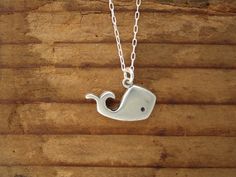 "This cute set is for Moms and daughters They are made using solid sterling silver, the mother whale measures 1\" across and the daughter 3/4\". The smaller whale hangs from a 16\" silver-plated cable chain and the larger whale hangs from an 18\" silver-plated cable chain. If you have two kids: https://www.etsy.com/listing/87244713/two-kids-famiy-necklace To see the \"mother\" necklace only go here: https://www.etsy.com/listing/62147582/spouts To see the \"daughter\" necklace only go here: https Whale Pendant, Contemporary Silver Jewelry, Whale Necklace, Sparkly Necklace, Oakland California, Cute Gift Boxes, Daughter Necklace, Kids Necklace, Pierced Jewelry