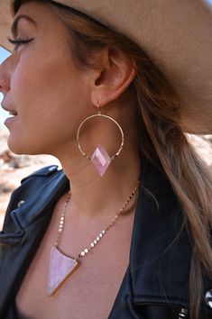 These stunning Rose Quartz gold hoop earrings are the perfect accessory for any outfit, and remind you to love yourself first every single day! They're versatile, and can be dressed up or down depending on the occasion. They are perfect for wearing to work, on a date, or to a special event. The soft pink hue of the rose quartz adds femininity and elegance, while the gold adds a touch of sophistication. Rose quartz is known for its calming and soothing energy, making these earrings not only beaut Trendy Rose Gold Drop Earrings, Rose Gold Single Hoop Earring For Party, Chic Rose Gold Hoop Earrings For Everyday, Chic Everyday Rose Gold Hoop Earrings, Chic Rose Gold Hoop Earrings For Party, Chic Pink Small Hoop Earrings, Minimalist Rose Gold Hoop Earrings For Party, Feminine Rose Gold Metal Jewelry, Chic Rose Gold Hoop Earrings For Pierced Ears