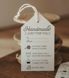 a tag that says handmade just for you on it sitting next to some cookies