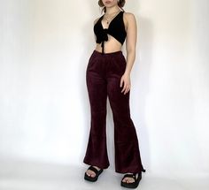 The Gianna Pants are designed with a velour fabric that provides both a luxurious feel and a comfortable fit. Featuring an elastic waistband and flared fit, these pants offer a retro silhouette. Model is 5'2 and wearing a S/M Romantic Essence, 70s Pants, Retro Silhouette, Velvet Flares, Womens Trousers, Velour Pants, Velour Fabric, Burgundy Velvet, Trousers Women