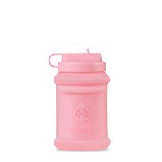 the hydro bottle is pink and has a straw in it's cap, with a lid