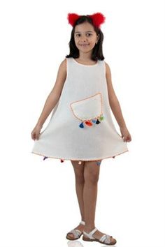 100% cotton shile fabric summer dress for kids. Scoop neck and sleeveless. Embroidered  on neck, sleeve and hem line. A decorative pocket on the front. This is a very cute ,and comfortable dress. The fabric is ideal for hot summer days. Available color is cream powder and available sizes are 1-2;2-3;4-5;5-6;7-8; and 9-10 years old. Your little one will really like this dress' look and comfort. Size                  Chest                             Length 2-3               60 cm /24 inches          46 cm/18 inches 4-5               64 cm  /25 inches         52 cm/21 inches 5-6               72 cm /28 inches          56 cm/22 inches 7-8                80 cm/31.5 inches        60 cm/24 inches 9-10             88 cm/35 inches            65 cm/26 inches Playful Summer Dresses With Pockets, White Cotton Sleeveless Beach Dress, Summer Cotton Dress With Pockets, Cotton Vacation Dresses With Pockets, Cute Cotton Sleeveless Dress For Vacation, Cute Summer Dresses With Pockets, White Cotton Summer Sleeveless Dress, White Casual Dress With Side Pockets, Casual White Dresses With Side Pockets