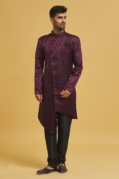 Wine sherwani with all over woven paisley pattern. Comes with churidar.
Components: 2
Pattern: Woven
Type Of Work: Paisley
Neckline: Mandarin Collar
Sleeve Type: Full
Fabric: Sherwani: Imp. Soft Jacquard, Churidar: Silk Dupion
Color: Wine
Other Details: 
Closure:
Sherwani: Button
Churidar: Drawstring
Note: Pocket square worn by model is not for sale
Occasion: Mehendi and Puja,Sangeet - Aza Fashions Traditional Chikankari Embroidered Kurta For Semi-formal Occasions, Formal Kurta With Zari Weaving For Festivals, Formal Banarasi Silk Kurta For Festive Occasions, Formal Zari Weaving Kurta For Diwali, Formal Festive Banarasi Silk Kurta, Traditional Semi-formal Sherwani With Pallu, Semi-formal Kurta With Traditional Drape For Diwali, Festive Banarasi Silk Kurta For Formal Occasions, Unstitched Kurta With Traditional Drape For Semi-formal Occasions