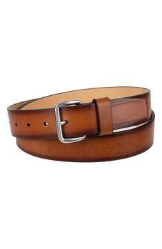 Burnished edges adds a rustic appeal to a stylish leather belt fitted with a soft rounded buckle for a casual finish. 1 1/2" belt width Leather Imported Classic Leather Belt Buckle With Antique Design, Casual Leather Belt Buckles With Antique Buckle, Leather Western Belts For Everyday, Rustic Leather Belt Buckle With Removable Belt, Brown Belt With Antique Buckle Classic Style, Classic Vintage Brown Belt Buckle With Belt Included, Brown Belt With Buckle For Everyday Use, Casual Brown Belt With Antique Buckle, Rustic Distressed Brown Leather Belt Buckles