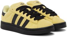 Low-top suede sneakers in yellow. Perforated detailing and leather signature serrated stripes in black at sides. · Lace-up closure · Logo embossed at padded tongue · Padded collar · Logo embossed at heel tab · Terrycloth lining · Treaded rubber sole in black Supplier color: Almost yellow/Core black Adidas Campus Black, Yellow Core, Yellow Adidas, Adidas Campus, Original Clothes, Suede Sneakers, Terry Cloth, Luxury Streetwear, Black N Yellow