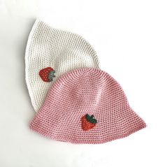 Beautiful, hand-crocheted bucket hat adorned with a strawberry applique.   A must have summer fashion accessory!  This light and breathable hat is made with 100% cotton. Hat should fit most teenagers and adults. Hat Circumference:  approximately 22 inches Hat Height: 9" from top to brim Hats are handmade and therefore may have natural imperfections. All products are lovingly created in a smoke-free and pet-free environment. Playful Cotton Bucket Hat With Short Brim, Cute Brimmed Cotton Sun Hat, Cute Cotton Brimmed Sun Hat, Playful Cotton Summer Bucket Hat, Cute Brimmed Summer Hat, Cute Brimmed Sun Hat For Summer, Cute Cotton Bucket Hat, Red Knitted Cotton Hat, Casual Crochet Hat One Size