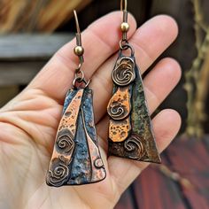 Immerse yourself in the artistry of metal with our handcrafted copper earrings, each pair making a bold and distinctive statement. Unique Silver-colored Copper Earrings, Artsy Nickel-free Copper Earrings, Unique Copper Earrings With Patina, Nature-inspired Copper Dangle Earrings, Artistic Silver-colored Copper Earrings, Copper Earrings, Jewelry Earrings Hoops, Copper, Hoop Earrings