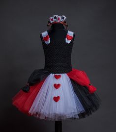 LAST DATE TO ORDER FOR CHRISTMAS  UK Wednesday ~ 13th December  International ~ Sunday 10th December  Off with their heads! ❤️👑 Inspired by your favourite Queen of Hearts. ♠️♦️♣️♥️ Made with soft red, black and white tulle. Decorated with red satin hearts and satin rose buds. Double sided white satin ribbon. Shoulder straps are adjustable. 'Playing Card' headband tiara included. PLEASE NOTE - As all of my dresses and skirts are made to order I cannot accept returns or exchanges so please double Queen Of Hearts Outfit Ideas, Queen Of Hearts Outfit, Hearts Outfit, Off With Their Heads, Girls Costumes, Princess Stephanie, Frozen Princess, Headband Tiara, Satin Roses