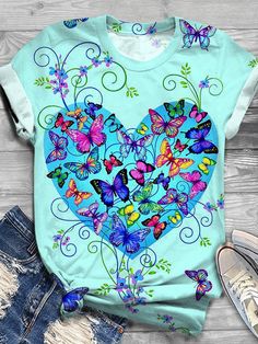 Butterfly Print Crew Neck T-shirt Blue Butterfly Print T-shirt For Summer, Cute Butterfly Print T-shirt For Spring, Blue Butterfly Print T-shirt For Spring, Blue Butterfly Print Short Sleeve T-shirt, Blue Short Sleeve T-shirt With Butterfly Print, Fun Green Printed Tops, Cute Butterfly Print T-shirt For Summer, Cute Butterfly Print Summer T-shirt, Cute Summer T-shirt With Butterfly Print