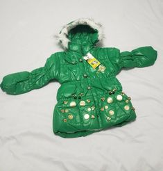 HLZFS HUAN LEZAI GIRLS COAT BRAND NEW SIZE XL. Green color Very unique Special design Including zipper and special buttons Very warm for the seasons fall and winter with Fur  inside the coat. Including special packets. Warm Cotton Outerwear For Spring, Trendy Warm Outerwear For Spring, Warm Green Outerwear For Fall, Warm Green Winter Outerwear, Green Winter Outerwear With Button Closure, Trendy Hooded Outerwear With Button Closure, Trendy Green Outerwear With Buttons, Fitted Green Winter Outerwear, Diy Jacket