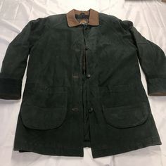 WOMEN'S ADVENTURE BOUND WILSONS DUFFLE COAT SZ Large GREEN SUEDE With LINING. This vintage jacket is In good condition does have one spot at the bottom of the jacket please see photos. This will come out if you take the time to clean unfortunately I have too many items to do this with so I’m listing it at this discounted price. Please see photos. If you have any questions please feel free to ask. Thanks for looking at a listing. We hope you have a great day! Green Long Coat For Outdoor Wear, Green Long Coat For Outdoor, Classic Green Outerwear For Outdoor, Classic Green Outdoor Outerwear, Classic Green Sport Coat For Outdoors, Classic Green Sport Coat For Outdoor, Green Long Coat With Pockets, Green Outerwear With Button Closure For Outdoor, Classic Green Long Coat Outerwear