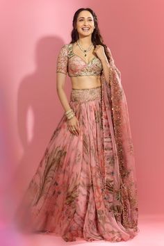 Pink lehenga with all over floral garden prints, elevated with an embroidered broad waistband using sequins, mirror. Paired with a blouse with printed base and sequin, mirror embroidery. Comes along with a dupatta with floral, sequin embroidered buttis. - Aza Fashions Wedding Floral Print Saree Set, Pink Floral Print Lehenga With Traditional Drape, Wedding Choli With Floral Print And Traditional Drape, Traditional Wedding Choli With Floral Print, Wedding Floral Print Choli With Traditional Drape, Bollywood Style Floral Print Wedding Sets, Pink Floral Print Lehenga For Wedding, Fitted Floral Print Lehenga For Wedding, Bollywood Floral Print Wedding Lehenga