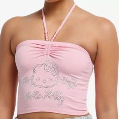 Hello Kitty Meets Y2k On This Pink Halter Top Featuring Her Face And Name In Rhinestones, And Pink Beads On The Halter Straps. 95% Cotton; 5% Spandex Wash Cold; Dry Low Length: 9" Imported Listed In Junior Sizes This Goes Well With The Hk Skirt I Have Listed Hello Kitty Rhinestone, Hello Kitty Decorations, Pink Halter Top, Emily The Strange, Tall Hoodies, Plus Size Swim, Hello Kitty Collection, Pink Beads, Socks And Tights