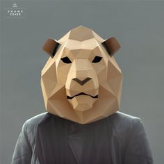 a paper model of a bear wearing a leather jacket and black hoodie, with the face of a man in an animal mask