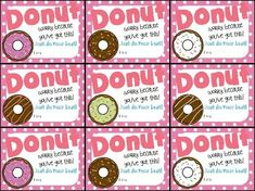 six donuts are on pink and white squares