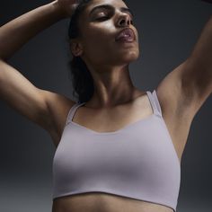 Feel calm and confident all day long in this strappy, gently supportive bra. A sewn-in 1-piece pad offers enhanced coverage and shaping while sweat-wicking technology helps keep you cool and comfortable. The fabric in the body and straps is lightweight, with softness that you can feel with every bend, stretch and shift. With a rounded V-neck to top it off, the bra has a clean finish that goes with any outfit. Athleisure Strappy Sports Bra With Built-in Bra, 4-way Stretch Sports Bra With Straps For Gym, Strappy 4-way Stretch Sports Bra, Gym Sports Bra With 4-way Stretch Straps, Sports Bra With Straps For Workout, Strappy Nylon Sports Bra For Yoga, Micro-elastic Gym Bra With Built-in Support, Compressive Strappy Sports Bra With Straps, Strappy Nylon Sports Bra With Built-in Bra