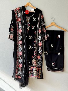 This beautiful black kurta set with embroidered designs will add elegance and comfort to any occasion. It is in size XXL (India). Set comes with top, pants, and dupatta. Bollywood Style Floral Embroidery Pant Set For Eid, Elegant Embroidered Black Lawn Suit, Elegant Black Embroidered Lawn Suit, Bollywood Style Floral Embroidered Pant Set For Eid, Bollywood Pant Set With Floral Embroidery For Eid, Black Bollywood Lawn Suit For Festive Occasions, Elegant Black Pant Set For Festive Occasions, Traditional Pant Set With Intricate Embroidery For Designer Wear, Traditional Black Palazzo Set With Chikankari Embroidery