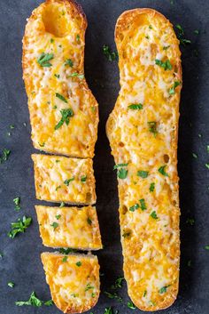 two pieces of bread with cheese and parsley