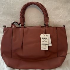 New With Tags. Tan Pebble Leather. Dimensions 15w X 11h. Crossover/Shoulder Strap Included Casual Satchel With Braided Handles For Errands, Spring Hobo Bag For Errands, Pattern Purse, Black Leather Handbags, Change Purse, Black Purses, Green Leather, Pebbled Leather, Cross Body Handbags