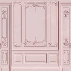 an image of a pink room with decorative paneling