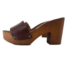 HANDMADE CLOGS wood-effect clogs made in italy -brown leather upper -heel 9 cm + plateau 3 cm -craftsman-made DON'T FORGET TO CHECK THE SIZE BEFORE YOU COMPLETE THE ORDER Size and LENGTH OF THE SHOE ALONG THE CURVE: 36 EU = 5 US = UK 4 = 23.50 CM 37 EU = 6 US = UK 5 = 24.00 CM 38 EU = 7 US = UK5.5 = 24.50 CM 39 EU = 8 US = UK 6 = 25.00 CM 40 EU = 9 US = UK6.5 = 25.50 CM 41 EU = 10US = UK7.5 = 26.00 CM Brown Open Toe Clogs With 4-inch Heel, Brown Wooden Heels With Leather Sole, Brown High Heel Sandals With Wooden Heel, Brown High Heel Clogs With Wooden Heel, Brown Open Toe Wooden Clogs, Brown High Heel Mules With Wooden Heel, Brown High Heel Mules With Deep Heel Cup, Brown Leather Mules With Platform, Brown Platform Wedge Heel Mules