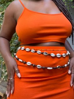 Cowrie Waist Beads, Waist Beads Over Dress, Wooden Waist Beads, Waist Bead Photoshoot Ideas, Cowrie Shell Waist Beads, Bohemian Waist Beads For Summer Beach, Bohemian Waist Beads For Beach In Summer, Bohemian Summer Festival Waist Beads, Adjustable Large Bead Waist Beads For Beach